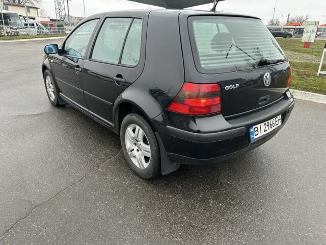 Черный Фольксваген Гольф, объемом двигателя 1.4 л и пробегом 244 тыс. км за 3900 $, фото 4 на Automoto.ua