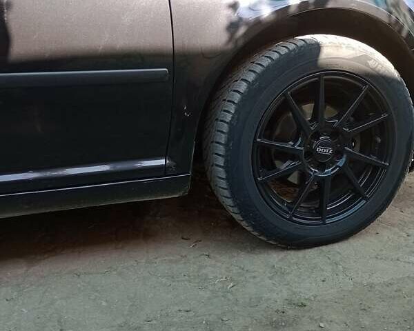 Черный Фольксваген Гольф, объемом двигателя 1.39 л и пробегом 174 тыс. км за 4700 $, фото 9 на Automoto.ua