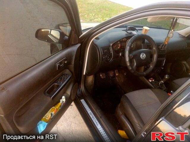 Черный Фольксваген Гольф, объемом двигателя 1.4 л и пробегом 256 тыс. км за 3800 $, фото 3 на Automoto.ua