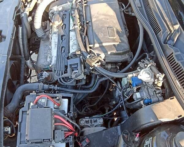 Черный Фольксваген Гольф, объемом двигателя 1.39 л и пробегом 280 тыс. км за 4400 $, фото 5 на Automoto.ua