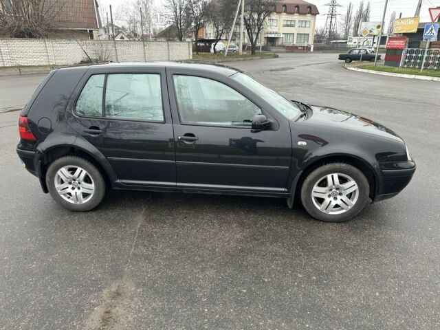 Черный Фольксваген Гольф, объемом двигателя 1.4 л и пробегом 244 тыс. км за 3900 $, фото 1 на Automoto.ua