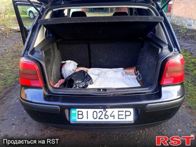 Черный Фольксваген Гольф, объемом двигателя 1.4 л и пробегом 240 тыс. км за 4300 $, фото 4 на Automoto.ua