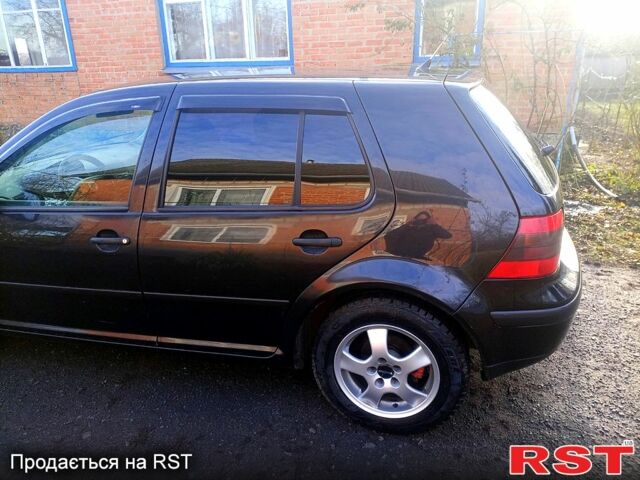 Черный Фольксваген Гольф, объемом двигателя 1.4 л и пробегом 240 тыс. км за 4300 $, фото 2 на Automoto.ua