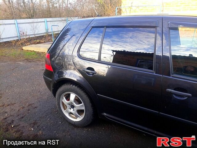 Черный Фольксваген Гольф, объемом двигателя 1.4 л и пробегом 240 тыс. км за 4300 $, фото 5 на Automoto.ua