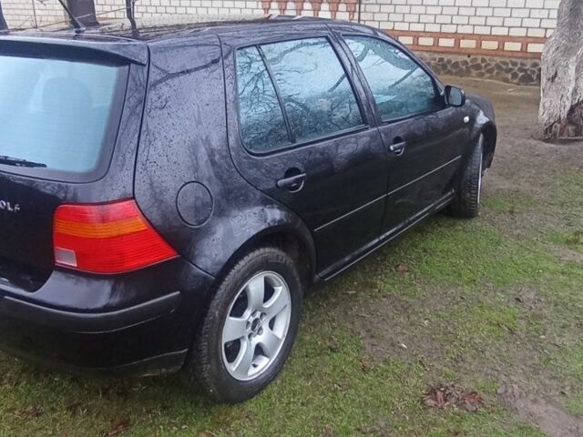 Чорний Фольксваген Гольф, об'ємом двигуна 1 л та пробігом 400 тис. км за 2000 $, фото 4 на Automoto.ua