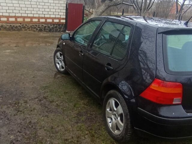 Чорний Фольксваген Гольф, об'ємом двигуна 1 л та пробігом 400 тис. км за 2000 $, фото 3 на Automoto.ua