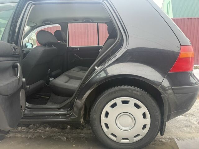 Черный Фольксваген Гольф, объемом двигателя 1.4 л и пробегом 290 тыс. км за 1300 $, фото 4 на Automoto.ua