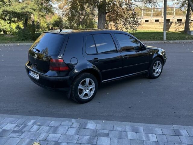 Черный Фольксваген Гольф, объемом двигателя 1.6 л и пробегом 324 тыс. км за 3900 $, фото 4 на Automoto.ua