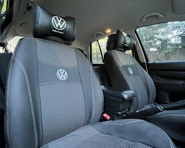 Черный Фольксваген Гольф, объемом двигателя 1.39 л и пробегом 246 тыс. км за 4500 $, фото 14 на Automoto.ua