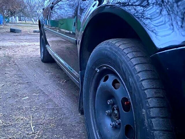 Черный Фольксваген Гольф, объемом двигателя 1.4 л и пробегом 226 тыс. км за 5399 $, фото 6 на Automoto.ua