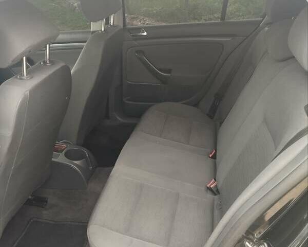 Черный Фольксваген Гольф, объемом двигателя 1.39 л и пробегом 243 тыс. км за 4700 $, фото 2 на Automoto.ua