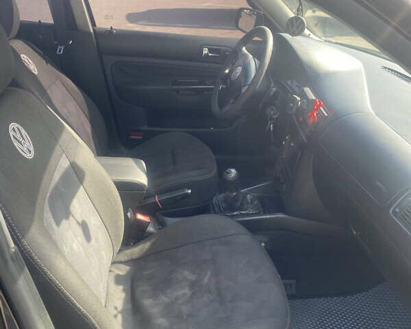 Черный Фольксваген Гольф, объемом двигателя 1.39 л и пробегом 245 тыс. км за 4700 $, фото 9 на Automoto.ua