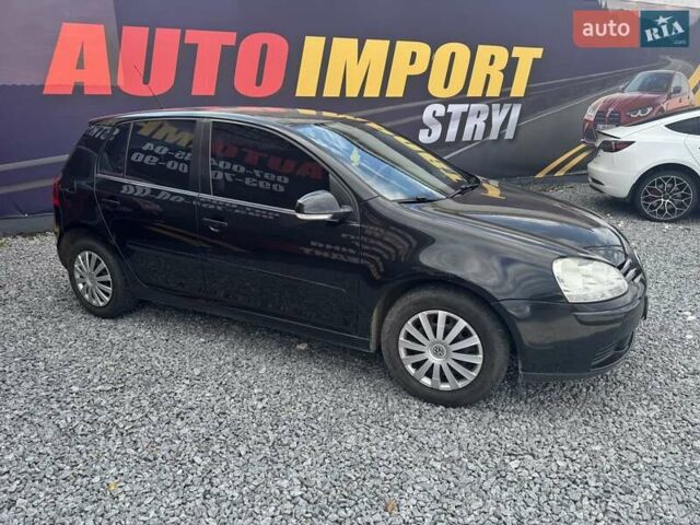 Черный Фольксваген Гольф, объемом двигателя 1.4 л и пробегом 298 тыс. км за 4900 $, фото 2 на Automoto.ua