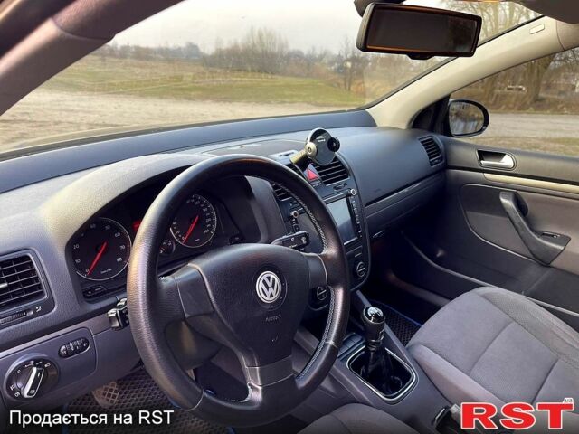 Черный Фольксваген Гольф, объемом двигателя 2 л и пробегом 233 тыс. км за 6200 $, фото 3 на Automoto.ua