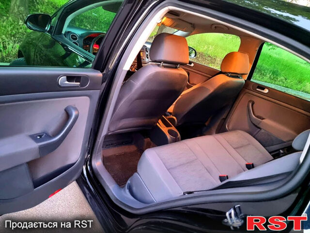 Чорний Фольксваген Гольф, об'ємом двигуна 1.4 л та пробігом 206 тис. км за 6499 $, фото 9 на Automoto.ua