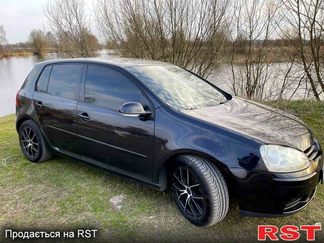 Черный Фольксваген Гольф, объемом двигателя 2 л и пробегом 233 тыс. км за 6200 $, фото 2 на Automoto.ua