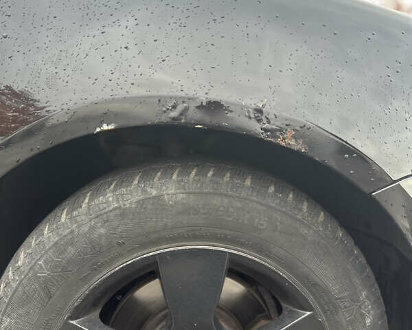 Черный Фольксваген Гольф, объемом двигателя 1.4 л и пробегом 234 тыс. км за 4500 $, фото 7 на Automoto.ua