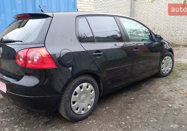 Черный Фольксваген Гольф, объемом двигателя 1.6 л и пробегом 246 тыс. км за 5099 $, фото 5 на Automoto.ua