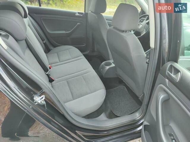 Фольксваген Гольф 2007 у Ямпіль на Automoto.ua Чорний Фольксваген Гольф, об'ємом двигуна 1.6 л та пробігом 189 тис. км за 6199 $, фото 17 на Automoto.ua