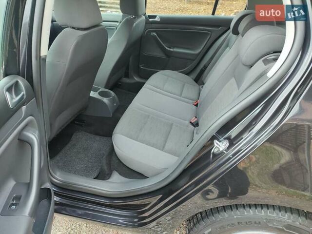 Фольксваген Гольф 2007 у Ямпіль на Automoto.ua Чорний Фольксваген Гольф, об'ємом двигуна 1.6 л та пробігом 189 тис. км за 6199 $, фото 18 на Automoto.ua