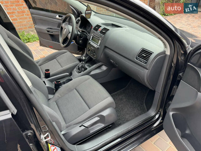 Черный Фольксваген Гольф, объемом двигателя 1.4 л и пробегом 246 тыс. км за 5600 $, фото 12 на Automoto.ua