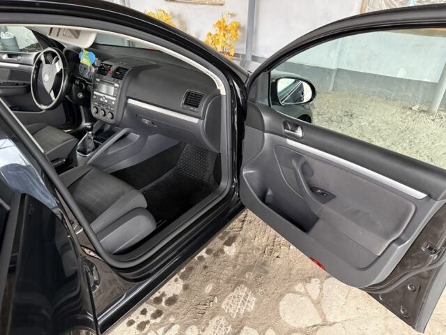 Фольксваген Гольф 2007 у Шостке на Automoto.ua Чорний Фольксваген Гольф, об'ємом двигуна 1.4 л та пробігом 220 тис. км за 5200 $, фото 7 на Automoto.ua