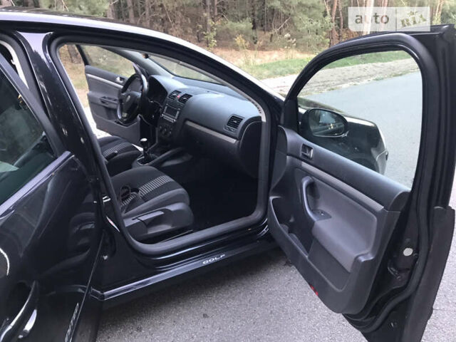 Черный Фольксваген Гольф, объемом двигателя 1.4 л и пробегом 206 тыс. км за 5900 $, фото 16 на Automoto.ua