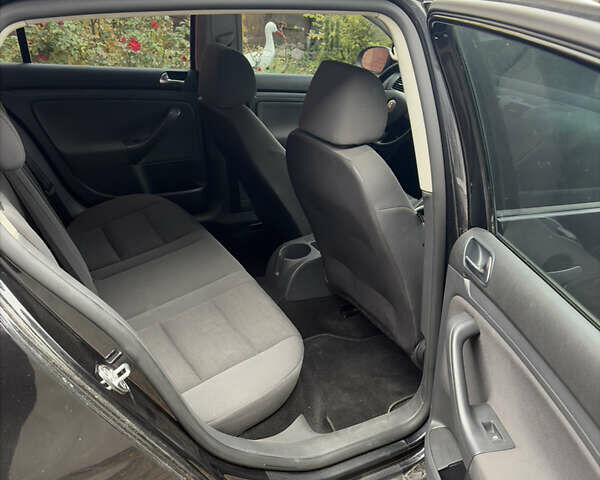 Черный Фольксваген Гольф, объемом двигателя 1.9 л и пробегом 141 тыс. км за 6900 $, фото 7 на Automoto.ua