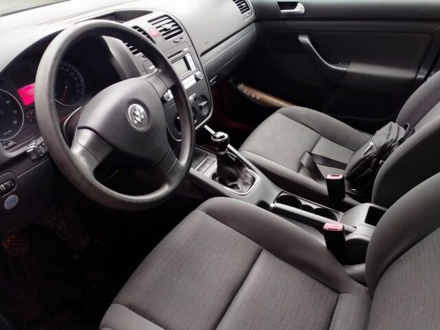 Черный Фольксваген Гольф, объемом двигателя 1 л и пробегом 230 тыс. км за 5850 $, фото 11 на Automoto.ua