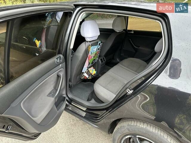 Черный Фольксваген Гольф, объемом двигателя 1.6 л и пробегом 196 тыс. км за 7000 $, фото 20 на Automoto.ua