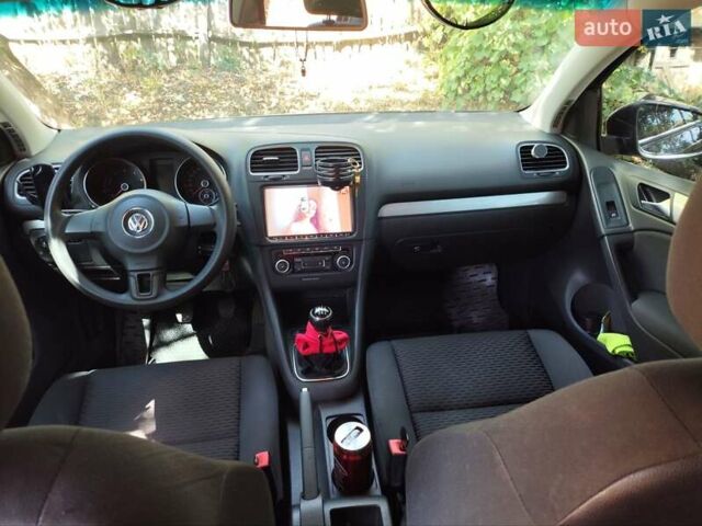 Черный Фольксваген Гольф, объемом двигателя 1.2 л и пробегом 134 тыс. км за 7200 $, фото 2 на Automoto.ua
