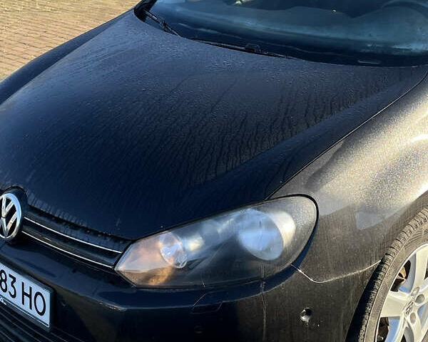 Черный Фольксваген Гольф, объемом двигателя 1.2 л и пробегом 243 тыс. км за 7700 $, фото 1 на Automoto.ua