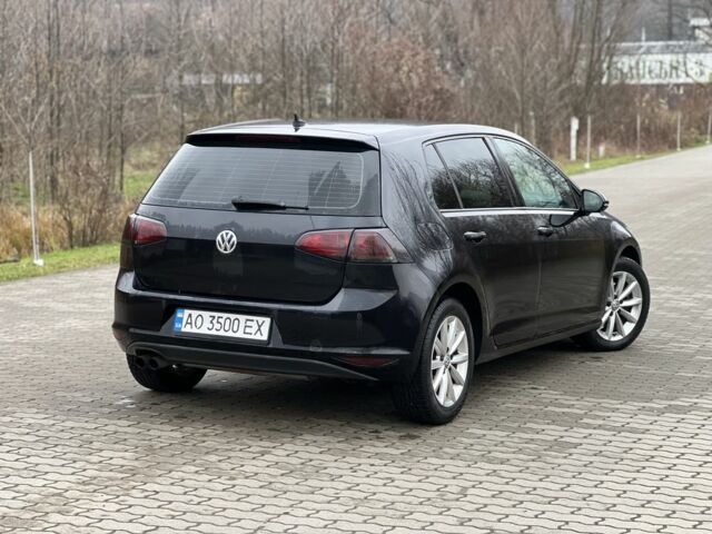 Черный Фольксваген Гольф, объемом двигателя 1.4 л и пробегом 210 тыс. км за 11200 $, фото 1 на Automoto.ua