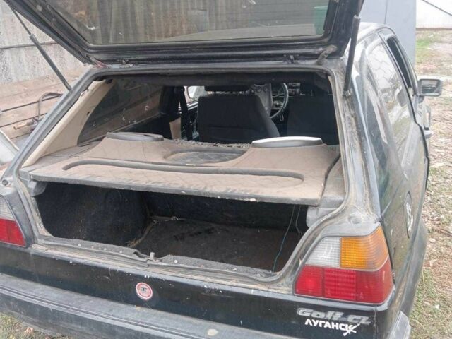 Черный Фольксваген Гольф, объемом двигателя 1.3 л и пробегом 280 тыс. км за 505 $, фото 1 на Automoto.ua