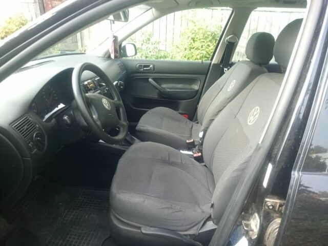 Черный Фольксваген Гольф, объемом двигателя 1.4 л и пробегом 243 тыс. км за 4250 $, фото 4 на Automoto.ua