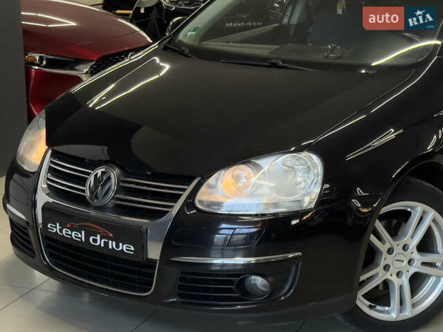 Черный Фольксваген Гольф, объемом двигателя 1.39 л и пробегом 230 тыс. км за 7299 $, фото 1 на Automoto.ua