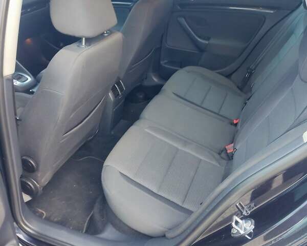 Черный Фольксваген Гольф, объемом двигателя 1.39 л и пробегом 166 тыс. км за 7200 $, фото 32 на Automoto.ua