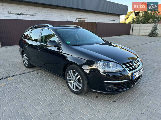 Черный Фольксваген Гольф, объемом двигателя 1.4 л и пробегом 148 тыс. км за 7800 $, фото 1 на Automoto.ua