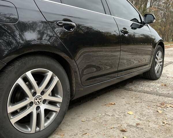 Фольксваген Гольф 2009 в Желтых Водах на Automoto.ua Черный Фольксваген Гольф, объемом двигателя 1.39 л и пробегом 163 тыс. км за 8100 $, фото 19 на Automoto.ua