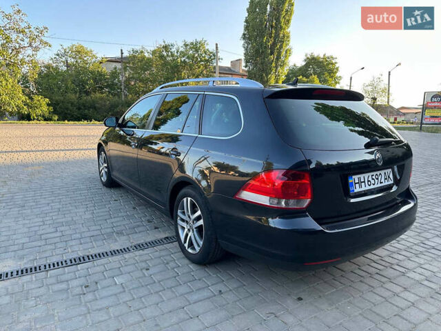 Черный Фольксваген Гольф, объемом двигателя 1.4 л и пробегом 148 тыс. км за 7800 $, фото 5 на Automoto.ua