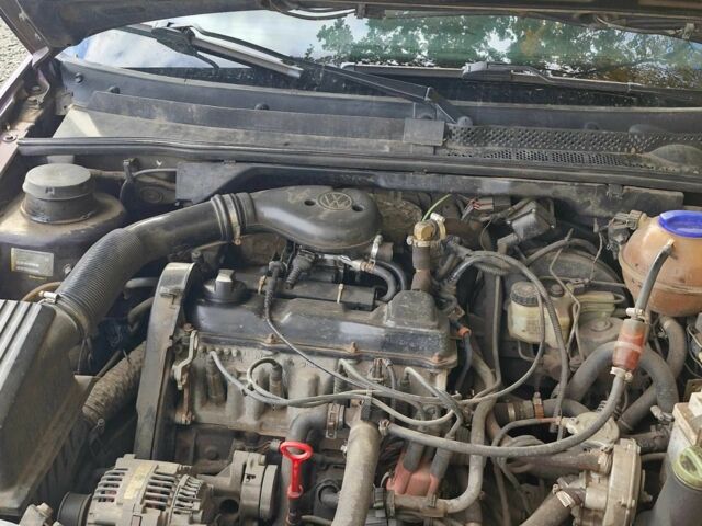 Фиолетовый Фольксваген Гольф, объемом двигателя 1.8 л и пробегом 420 тыс. км за 2458 $, фото 7 на Automoto.ua