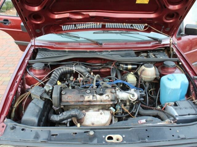 Червоний Фольксваген Гольф, об'ємом двигуна 1.3 л та пробігом 187 тис. км за 1650 $, фото 22 на Automoto.ua