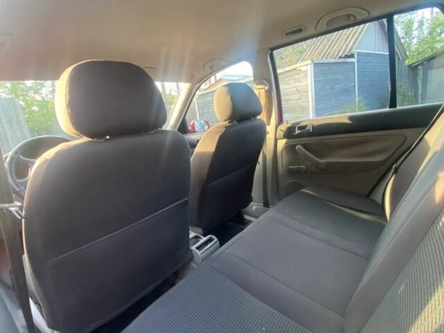 Красный Фольксваген Гольф, объемом двигателя 1.4 л и пробегом 270 тыс. км за 3000 $, фото 13 на Automoto.ua