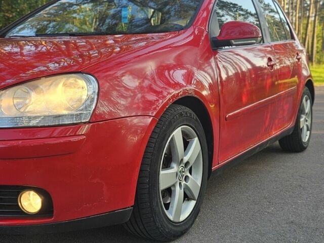 Фольксваген Гольф 2006 у Житомирі на Automoto.ua Червоний Фольксваген Гольф, об'ємом двигуна 2 л та пробігом 337 тис. км за 2757 $, фото 9 на Automoto.ua