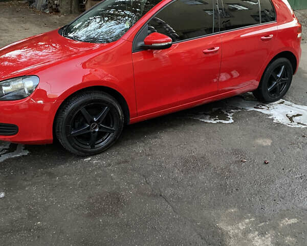 Красный Фольксваген Гольф, объемом двигателя 1.4 л и пробегом 205 тыс. км за 7350 $, фото 1 на Automoto.ua