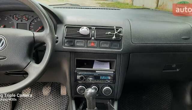 Червоний Фольксваген Гольф, об'ємом двигуна 1.39 л та пробігом 213 тис. км за 4150 $, фото 9 на Automoto.ua