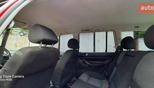 Червоний Фольксваген Гольф, об'ємом двигуна 1.39 л та пробігом 213 тис. км за 4150 $, фото 10 на Automoto.ua