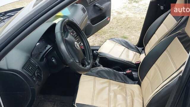 Серый Фольксваген Гольф, объемом двигателя 1.39 л и пробегом 238 тыс. км за 3500 $, фото 8 на Automoto.ua