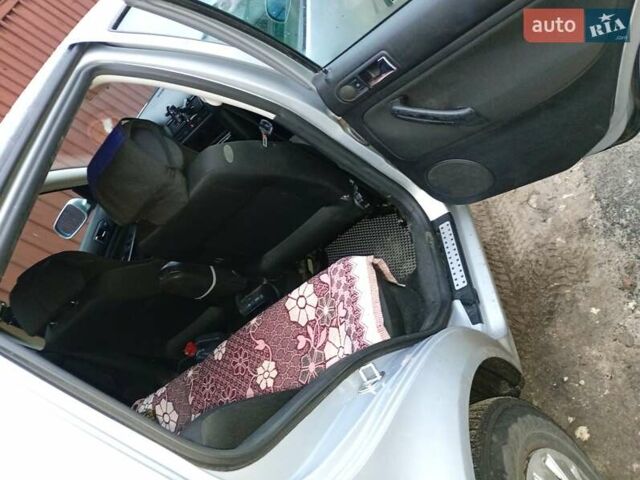 Серый Фольксваген Гольф, объемом двигателя 1.39 л и пробегом 299 тыс. км за 4500 $, фото 12 на Automoto.ua