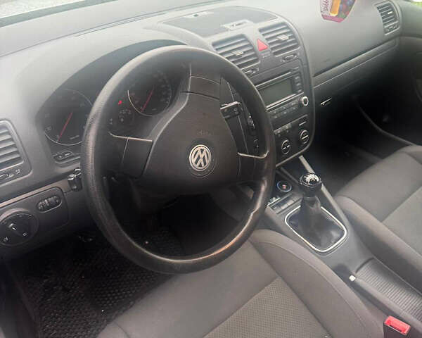 Серый Фольксваген Гольф, объемом двигателя 1.39 л и пробегом 233 тыс. км за 4900 $, фото 6 на Automoto.ua